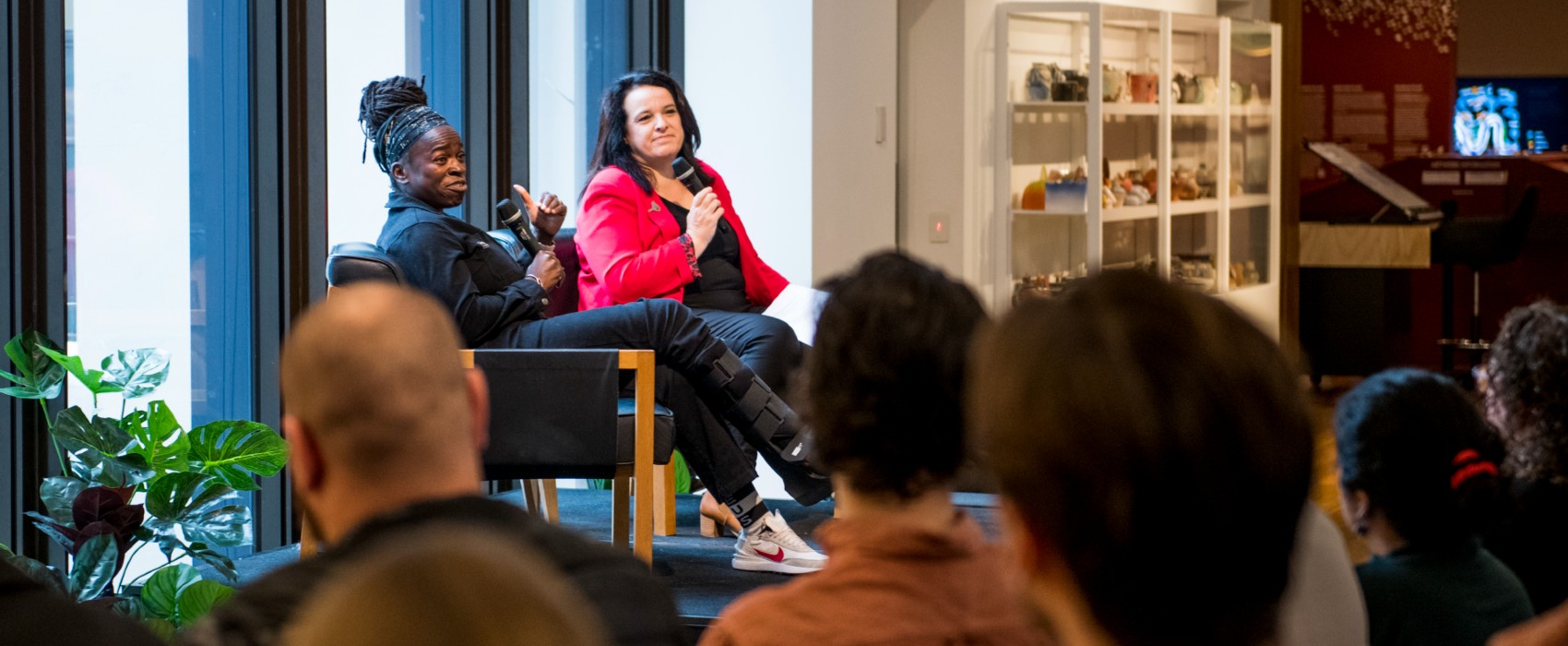 Luli Adeyemo and Fiona Armstrong on stage at the Museum of Brisbane.